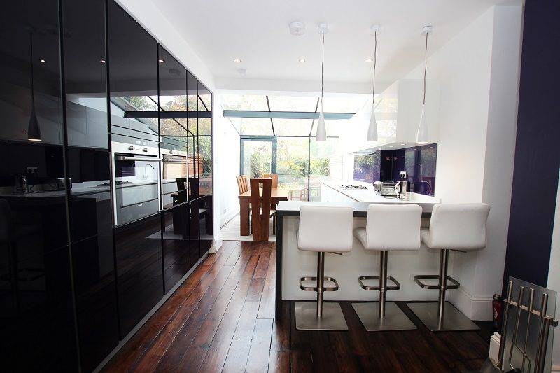 2. Blackberry Glass Kitchen Tall Units Wih White Gloss Peninsula | Jaystone Kitchens, Oldham