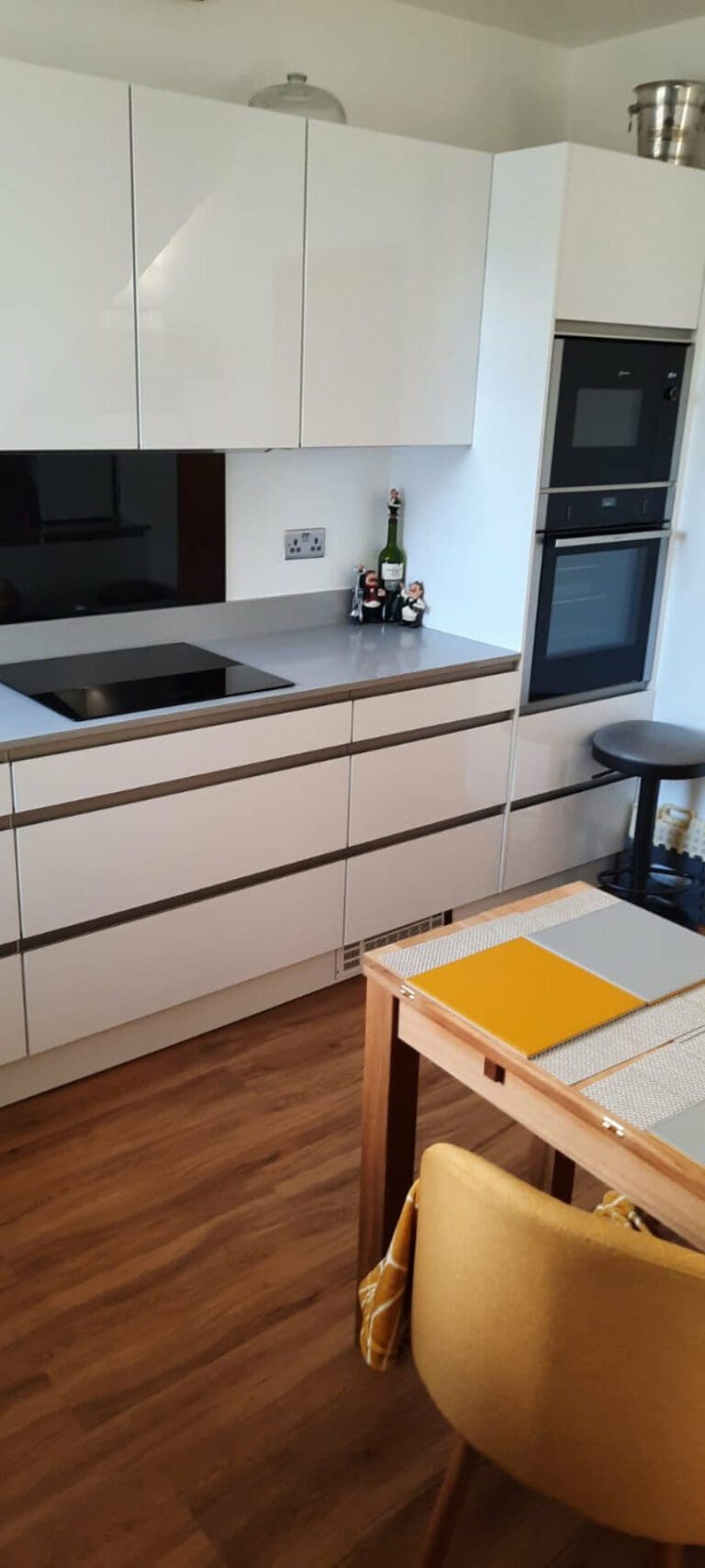 White Handleless Compact Kitchen