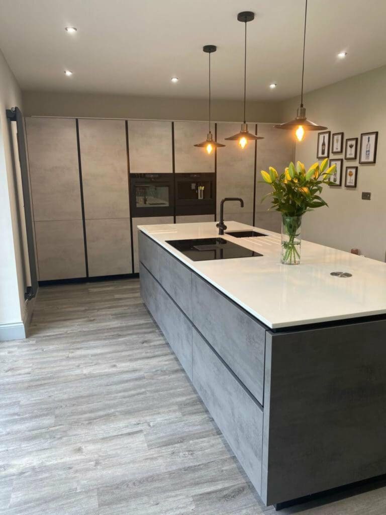 Handleless Concrete Kitchen With Island